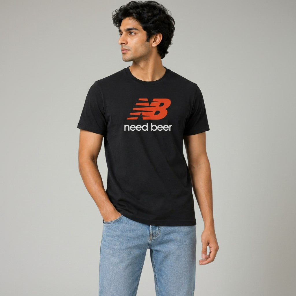 Shuflz black 100% premium cotton unisex t-shirt with orange and white "need beer" graphic.